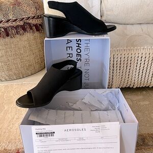 Size 7 medium , new in box , 
Aerosoles black fabric wedge sandal